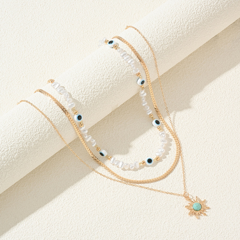 Long pearl necklace wholesale, european and american cross-border vintage eight-pointed star layered jewelry pendant, women's high-end collarbone chain