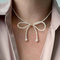 Bow choker necklace female fashion elegantsweet imitation pearl string chain niche styleclassy fairy style necklace