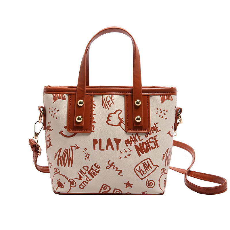 Cute cartoon printed bucket bag women 2025 new messenger bag women ins personality graffiti shoulder bucket bag