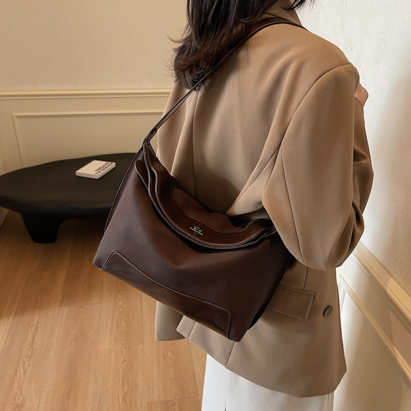 Cross-border design contrasting color splicing canvas bag women's 2025 new fashion trend shoulder messenger women's bag tote bag