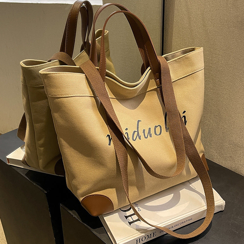 Canvas bag women's large-capacity 2023 new summer versatile simple shoulder bag cloth bag class commuter tote bag