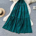 French-inspired, strapless, and stylish dress for women. high-waisted, slimming, and featuring a flattering ruffle hem. perfect for summer, this long, flowing dress comes in a chic green