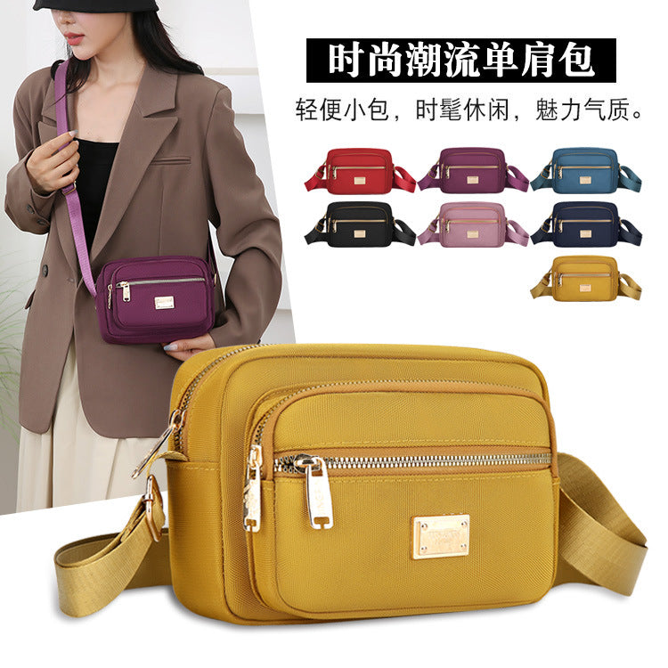 Portable commuter small square bag multi-layer storage business cashier bag simple and durable Oxford cloth shoulder messenger bag wholesale
