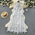 Sophisticated chic: women's polka dot maxi dress with bow tie, asymmetrical ruffle hem - autumn  collection