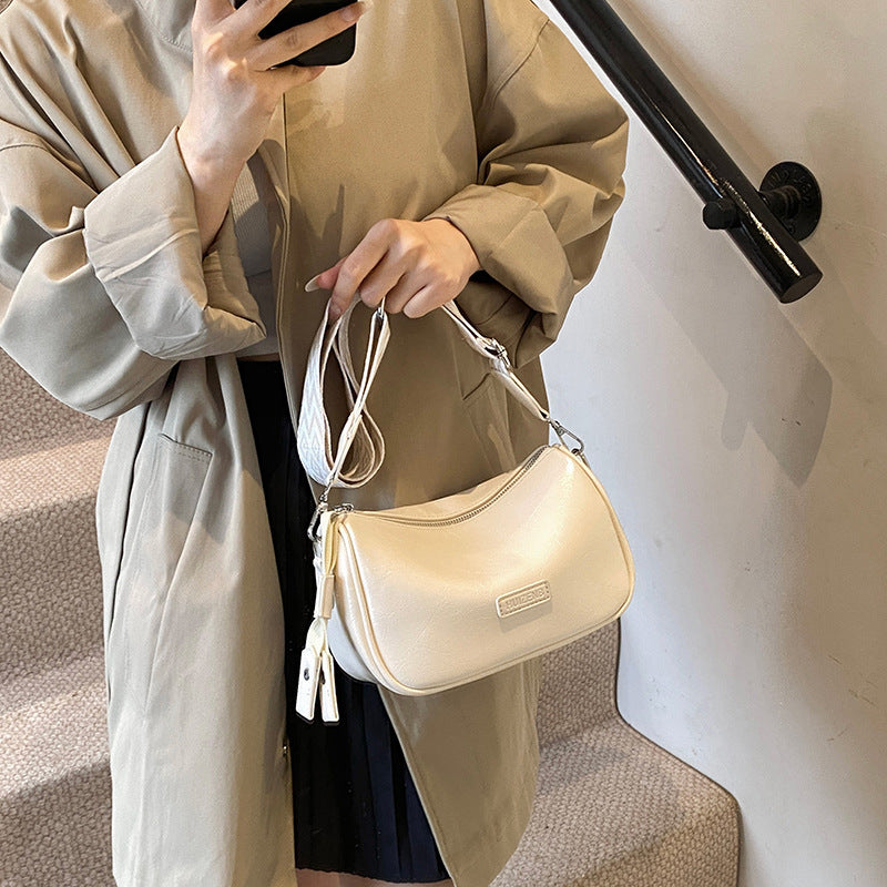 Retro bag women's 2025 new solid color texture shoulder pillow bag niche versatile messenger bag