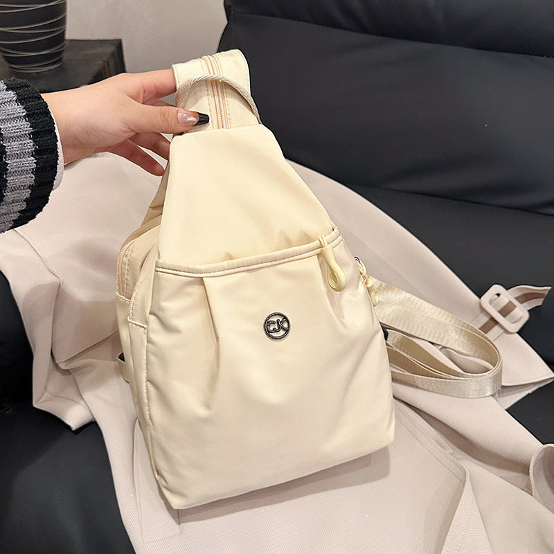 New fashionable women's washed cloth backpack, light and simple breast bag, versatile travel, large-capacity commuter bag wholesale