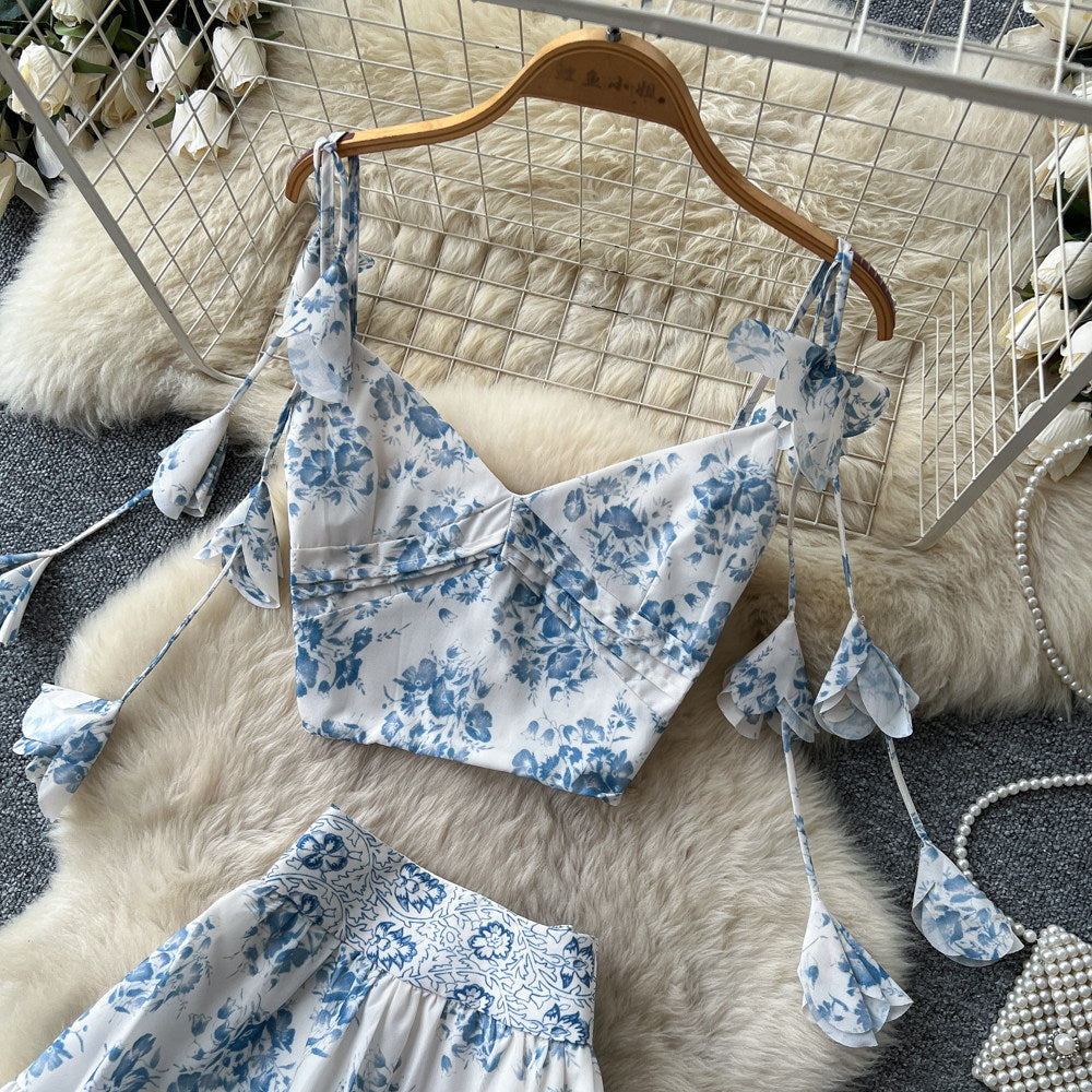 Vacation-ready blue floral two-piece set: women's summer high-waisted maxi skirt outfit - perfect for a garden getaway