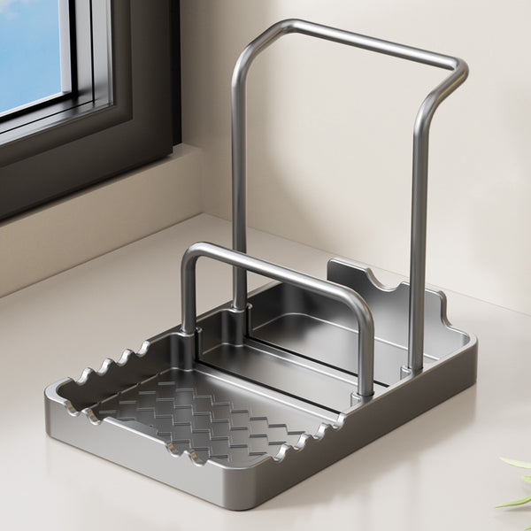 Gun ash, kitchen lid rack, spatula, spoon, countertop, seated storage, cutting board, chopping board, rag rack artifact