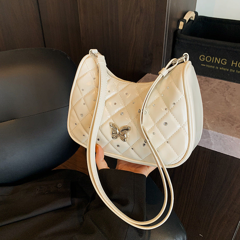 Foreign style simple rhombus single shoulder armpit bag women 2025 new high-end niche diamond-encrusted messenger bag wholesale