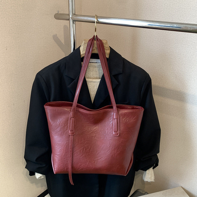 High-end retro soft leather women's bag 2026 new simple tote bag cross-border easiest for matchpure color handbag armpit bag