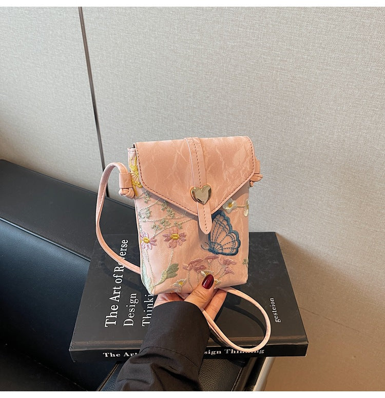 Cross-border embroidered canvas bag women's summer 2025 new fashion niche messenger bag Korean version Internet celebrity popular mobile phone bag
