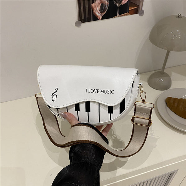 Trend large capacity 2025 spring new fashion splicing personalized Korean version piano keys one shoulder messenger bag women