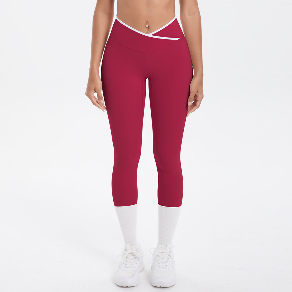 Naked-feel, figure-hugging, high-waisted yoga pants with a contrasting color block design. perfect for outdoor leisure, running, and quick-drying fitness workouts