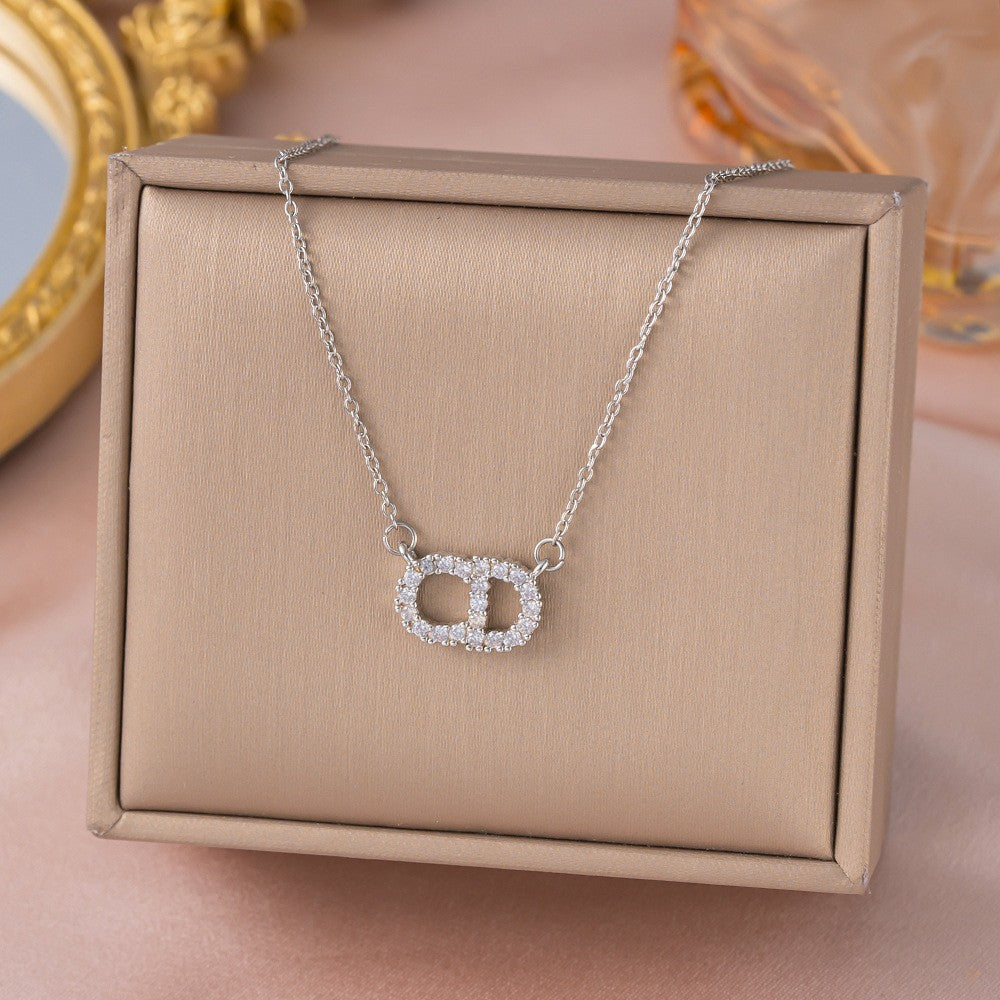 Copper inlaid zirconium four-leaf clover necklace for women, titanium steel real gold plating popularinsfashion flower exquisite sweater chain jewelry