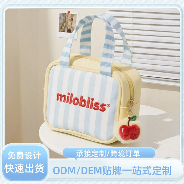 Customized new Korean color matching striped hand carry cosmetic bag, skin care product storage bag, cute large-capacity cosmetic bag