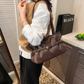 2026 early spring hot-selling chic handbag - women's unique leather belt-embellished high-end underarm bag - large capacity commuter bag