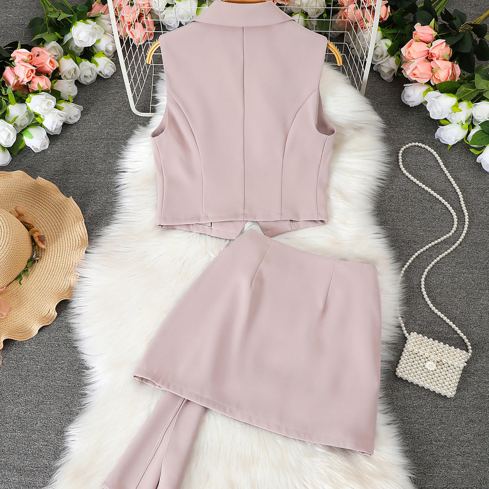 Women's sleeveless vest with suit collar + high-waisted midi skirt set, featuring metal buckle detail