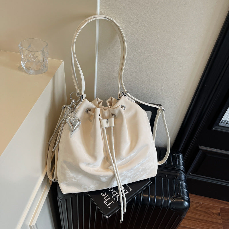 Cross-border light luxury fashion design shoulder bag women's 2025 summer simple texture backpack commuter messenger bag tide