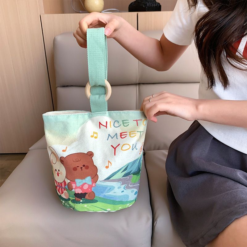 Cute cartoon canvas tote bag for women, 2024 new style handheld bucket bag, large capacity lunch bag, fashionable cloth handbag