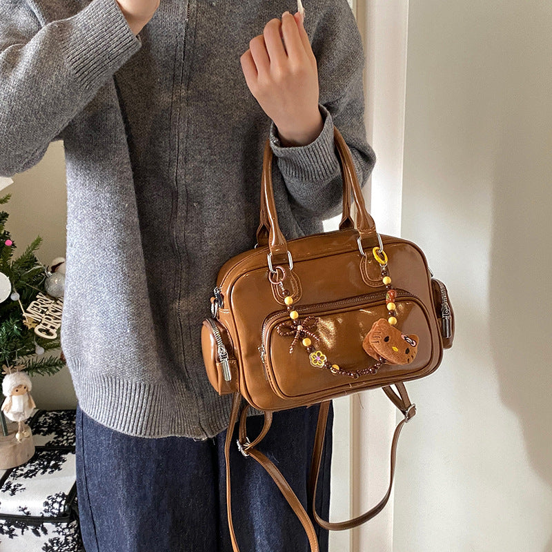 Versatile preppy style backpack for women, 2025 new trendy niche handbag, highland dog minimalist retro women's bag