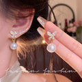 Sparkling butterfly pearl front and back two-wear stud earrings for women 2026 new arrivalniche stylesense of design earringselegant earrings