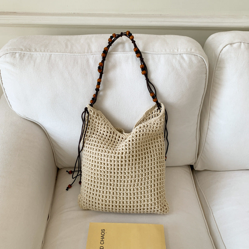 Cross-border niche design mesh bag hollow woven tote bag shoulder messenger bag 2025 new leisure style beach bag