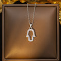 European and american cross-border titanium steel weight hand-set diamond necklace hot style color zircon pendant high-end personalized clavicle chain jewelry