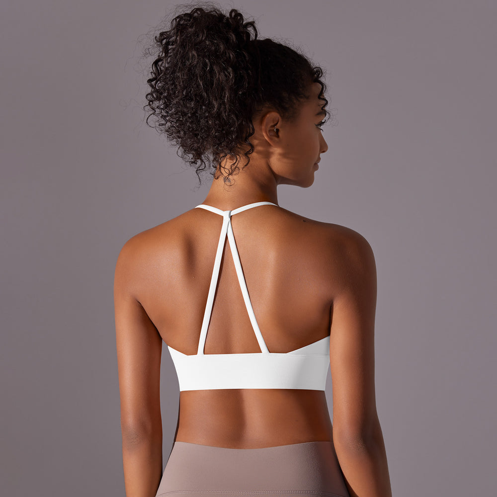Naked sensation strappy yoga bra - triangle back, push-up, shaping sports bra - workout top for yoga and fitness