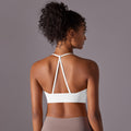 Naked sensation strappy yoga bra - triangle back, push-up, shaping sports bra - workout top for yoga and fitness