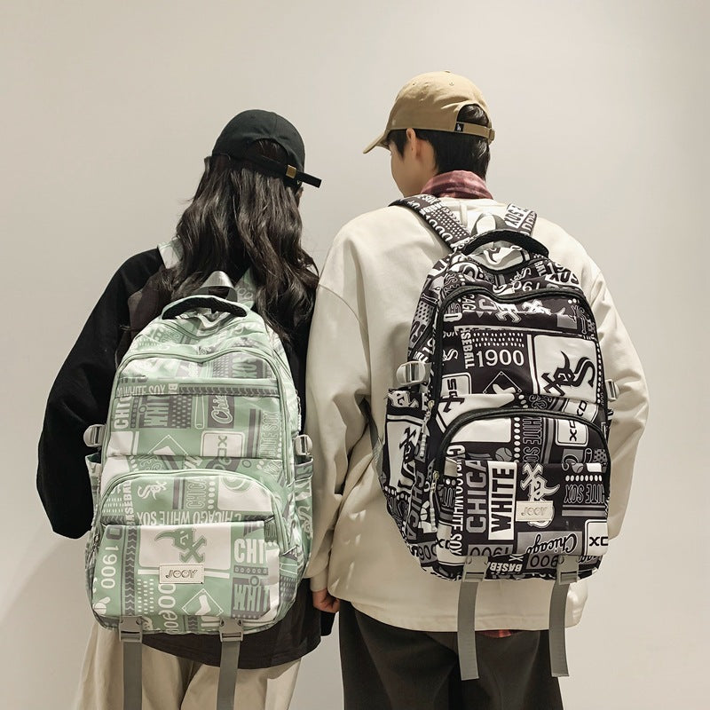 New large-capacity Korean version of middle school students, junior high school backpacks, men's fashion trend graffiti schoolbags, women's strong backpacks