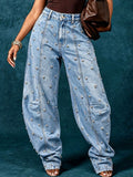 European and american style women's washed denim jeans with metal rivet embellishments, high waist, split seam detail, relaxed fit, and wide leg design