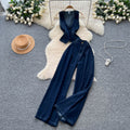 European and american retro hot girl outfit: women's autumn deep v sleeveless denim shirt + high-waisted slimming trousers with a drapey fit