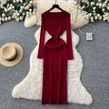 French chic high-end round neck metallic buckle single-breasted slim-fit slit long sleeve knitted bodycon dress