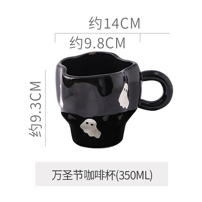 Creative halloween-themed ceramic cup and saucer set, featuring an irregular design with pumpkin and bat motifs. perfect for coffee or tea