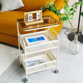 Cream style living room sofa next to several popular snacks multi-layer storage rack bedroom bedside table storage rack trolley