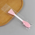 Shovel-shaped facial cleansing brush; rose pink