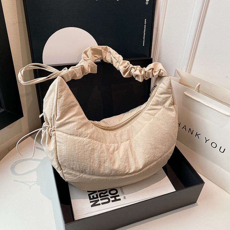 Fashion bag women's 2025 new college style dumpling bag casual large capacity shoulder messenger bag