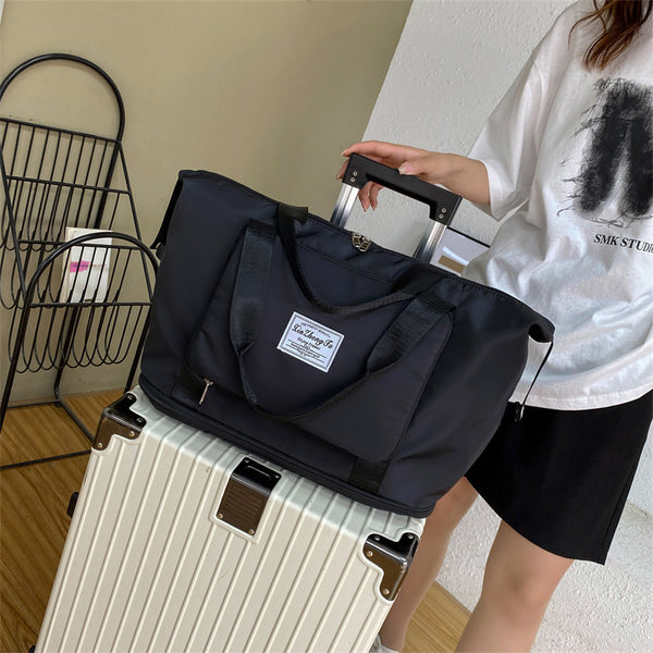 Foldable travel bag women's large-capacity waterproof shoulder bag portable storage bag travel portable luggage storage bag