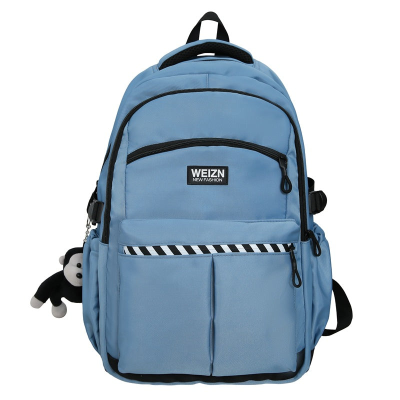 School bag male large capacity junior high school student middle school student fashion trend simple backpack female business travel bag