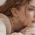 hot-selling metal texture cut out flower earrings japanese and korean version of asymmetrical texture classy sense ins earrings for women