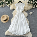 French sleeveless tie-up a-line tulip dress - women's summer high-waisted cinched waist tie detail flowy luxury work dress