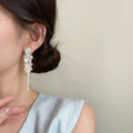 Zircon flower shell beach vacation style tassel long earrings for women, square and round face jewelry, 2026 new high-end design