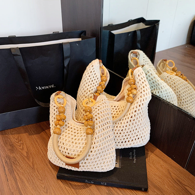 Casual large-capacity cotton thread woven bag New hollow hand-woven shoulder bag Vacation beach bag Versatile women's bag