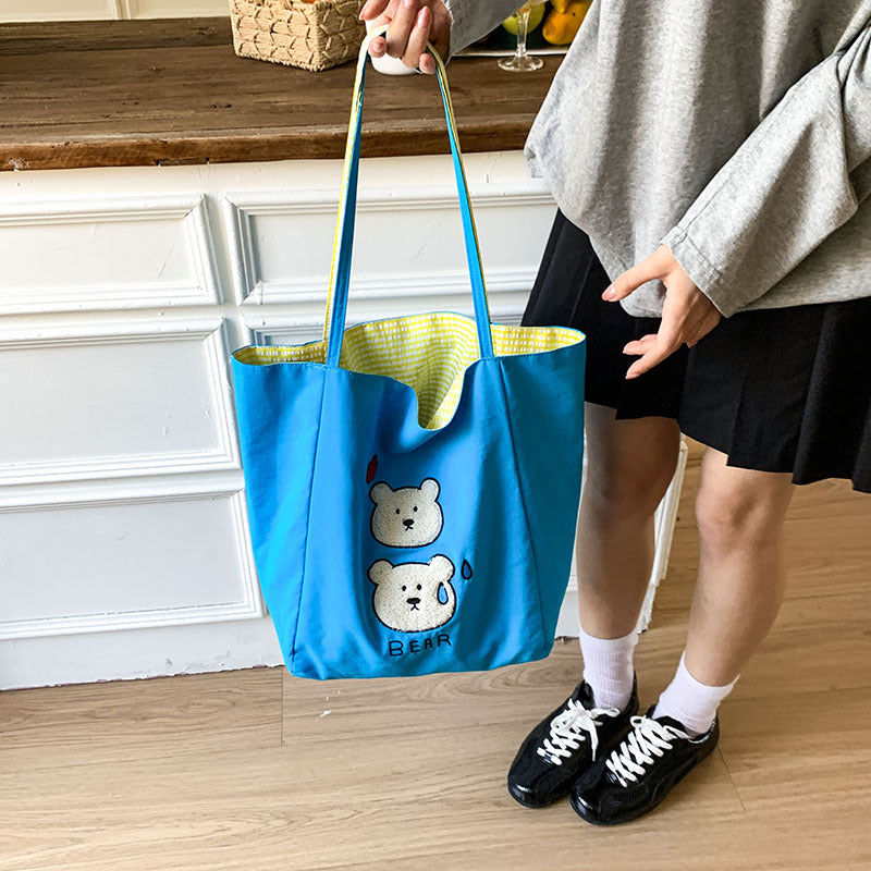 Canvas bag 2025 new women's handheld cloth bag large capacity carrying book bag junior high school students tutoring embroidered shoulder bag