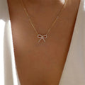 Customized necklaces: european and american cross-border jewelry, minimalist fashion bow pendant, women's zinc alloy diamond-studded necklace