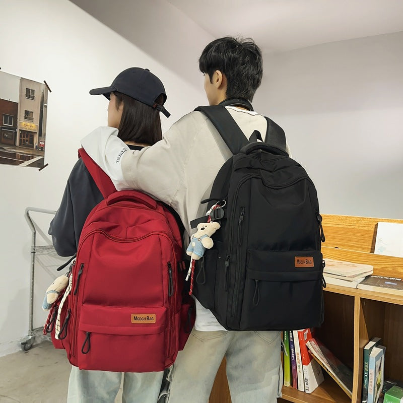 New high school students reduce the burden of backpacks, large-capacity student schoolbags, women's leisure travel, mountaineering backpacks, men's