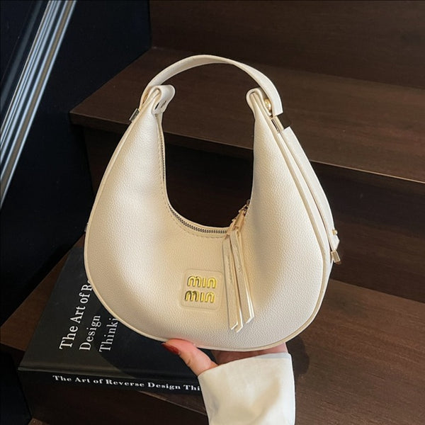Simple underarm dumpling bag 2025 summer new Korean version handbag niche crescent bag commuter fashion shoulder bag