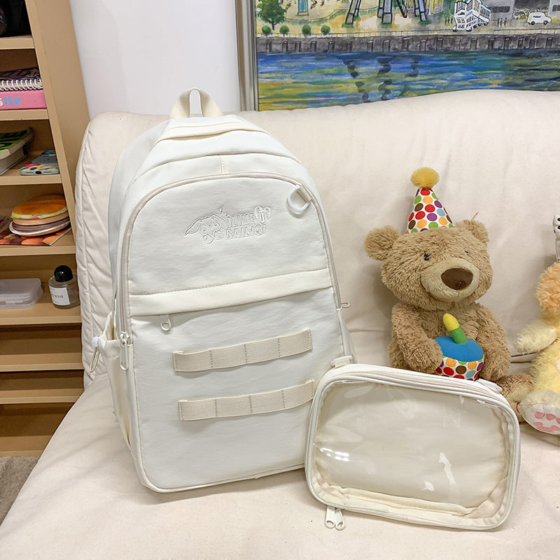 Solid color detachable badge personalized korean style high school student backpack large capacity minimalist versatile college student backpack