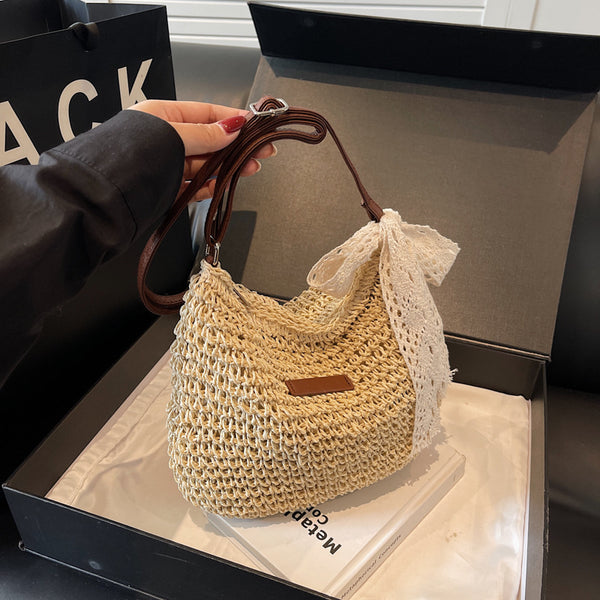 Woven straw messenger bag women's large capacity 2025 new summer versatile bucket bag seaside vacation beach bag