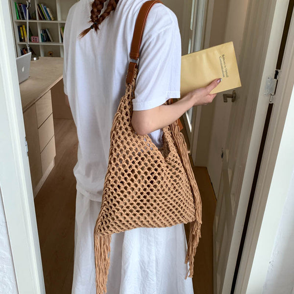 2025 new retro fringed bag women's hollow seaside woven bag beach bag Sen Meng women's shoulder tote bag